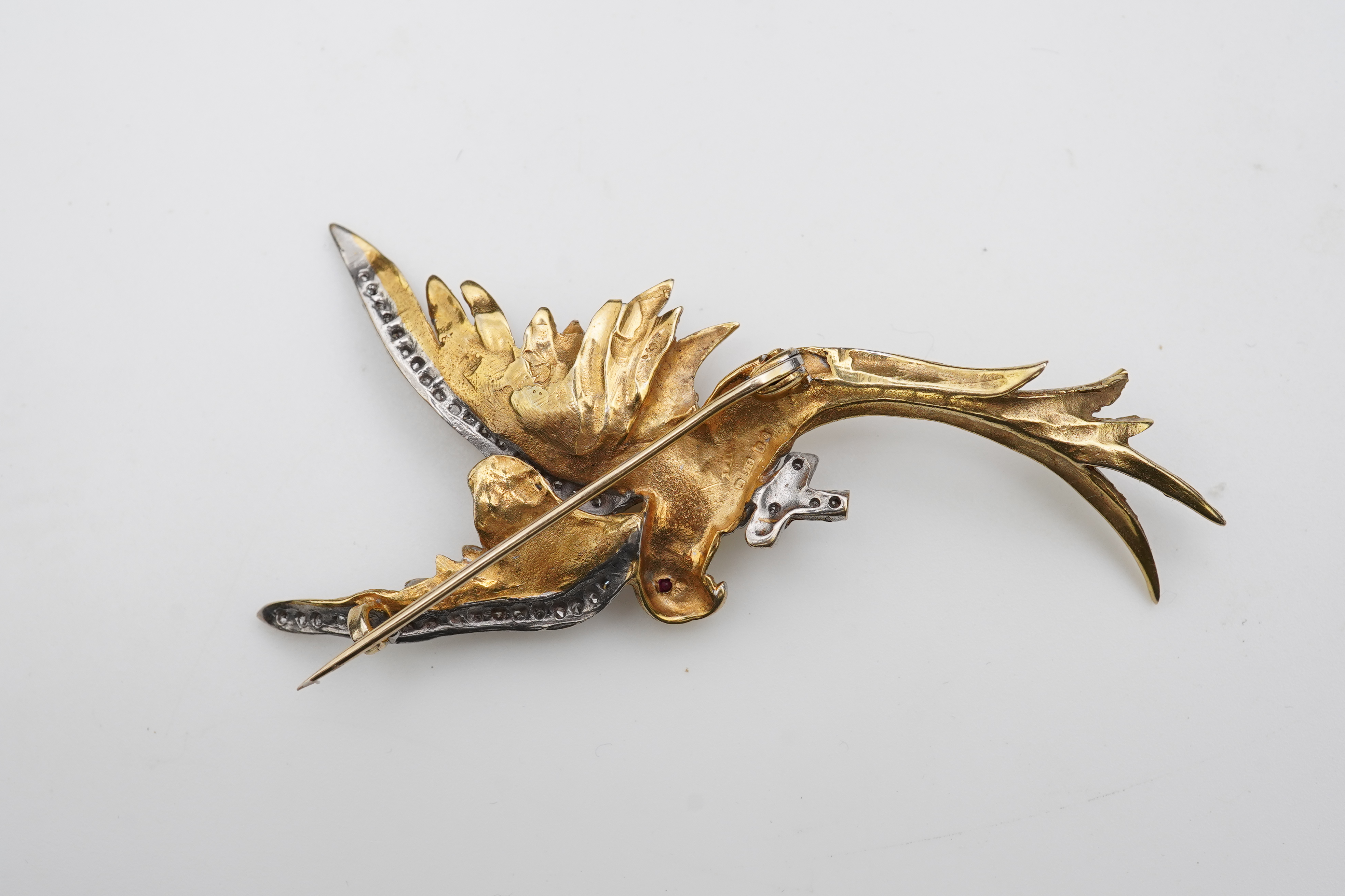 A 9ct gold and diamond brooch, circa 1988